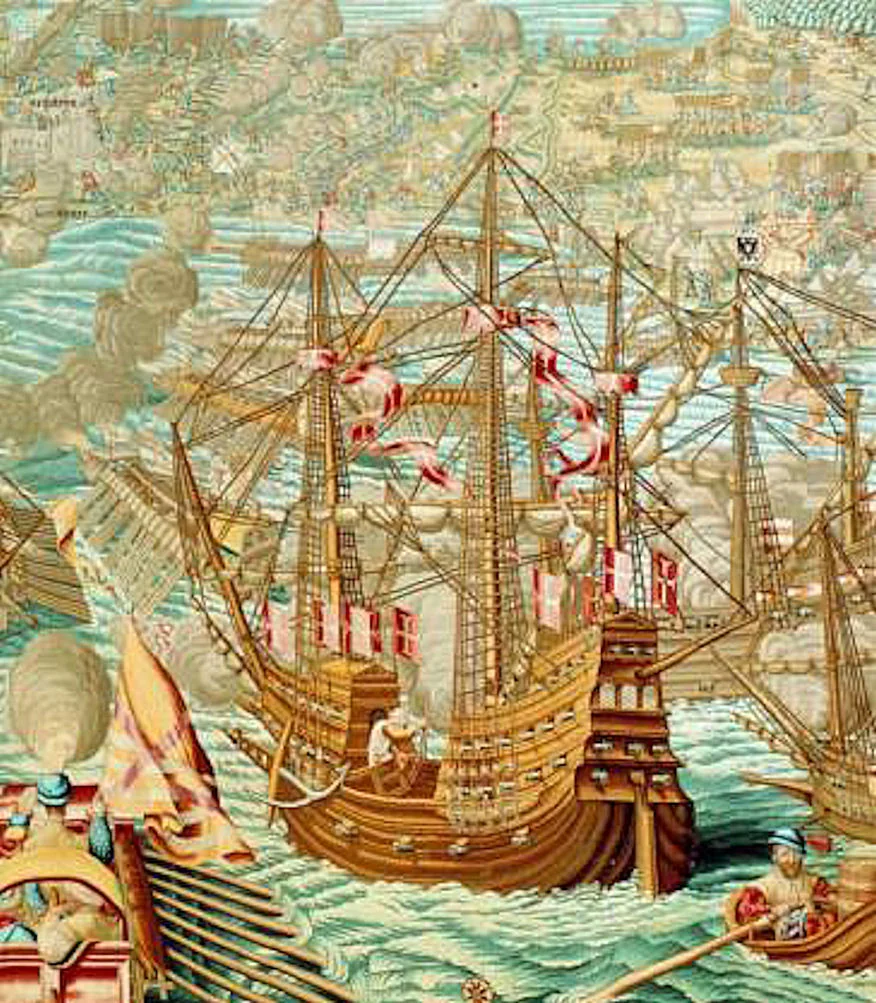 Galeón de guerra del siglo XVI empavesado con banderas y con las portas de artillería abiertas, rodeado de galeras, con la costa al fondo.
